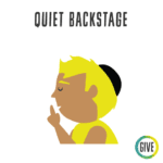 Quite Backstage. A blond child with a yarmulke holds his finger to his lips in a shushing gesture.