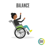 Balance. A dark skinned student balances on the back wheels of their wheelchair